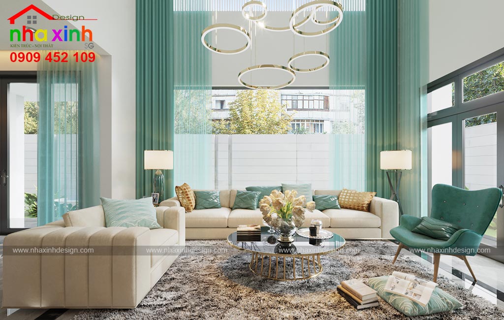 Sử dụng gam màu xanh trong thiết kế phòng khách của mẫu biệt thự hiện đại