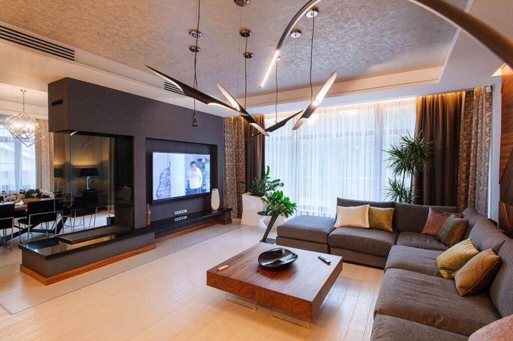 Tủ để tivi phòng khách hiện đại tông màu đen xám kết hợp lò sưởi mặt kính