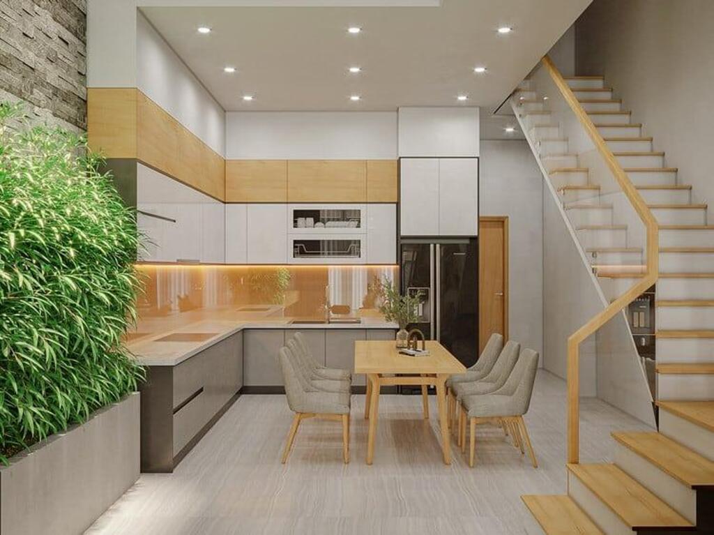 Không gian bếp nổi bật với gam màu tươi sáng cùng nội thất gỗ