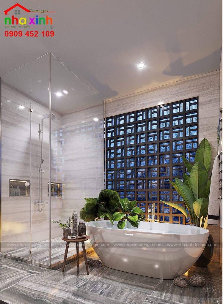 Phòng tắm đầy đủ tiện nghi với thiết kế cửa sổ ấn tượng và cây xanh tạo cảm giác gần gũi thiên nhiên