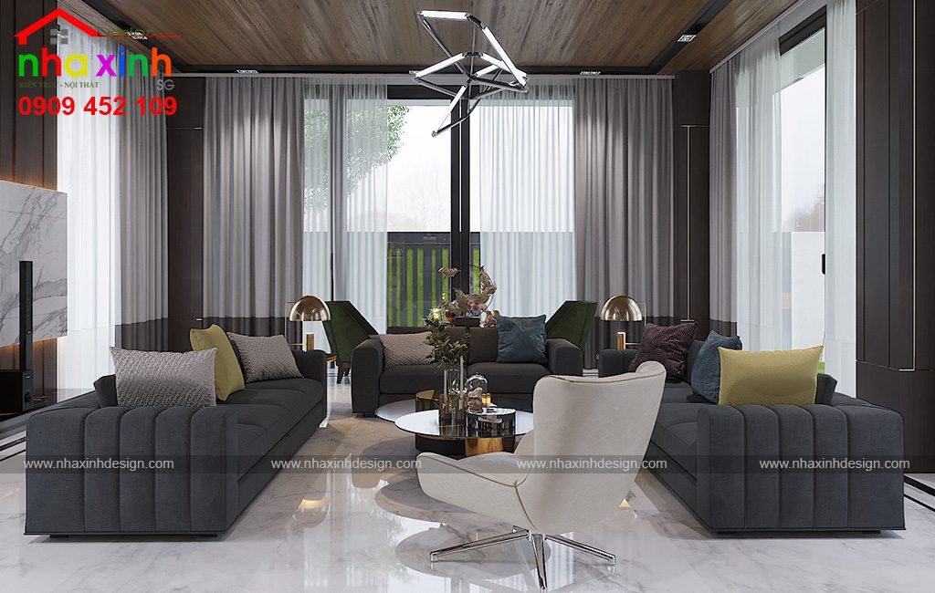Phòng khách rộng rãi tràn ngập ánh sáng tự nhiên cũng những món đồ nội thất có thiết kế ấn tượng