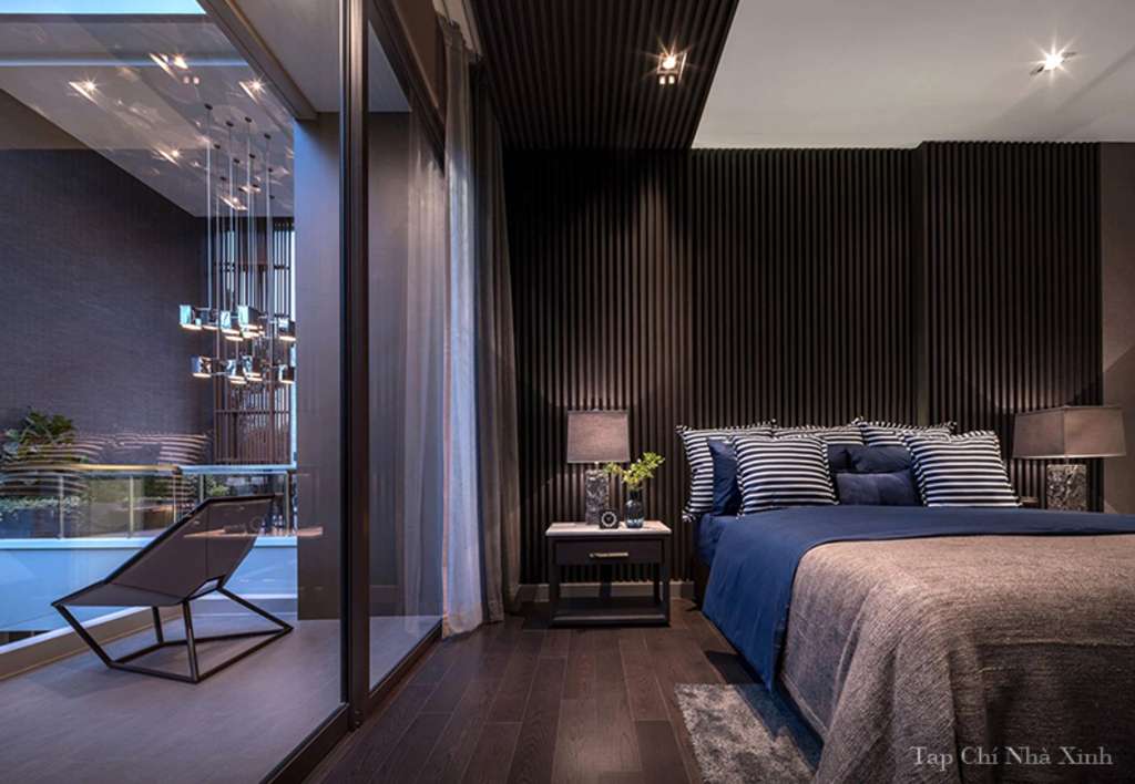 Mẫu phòng ngủ được thiết kế nổi bật với tone màu trầm ấm